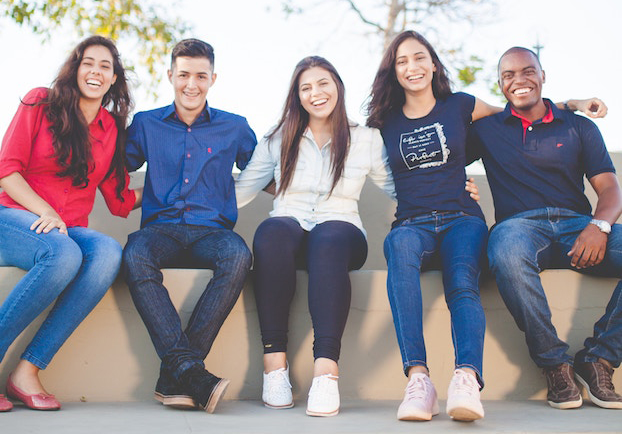 students hugging