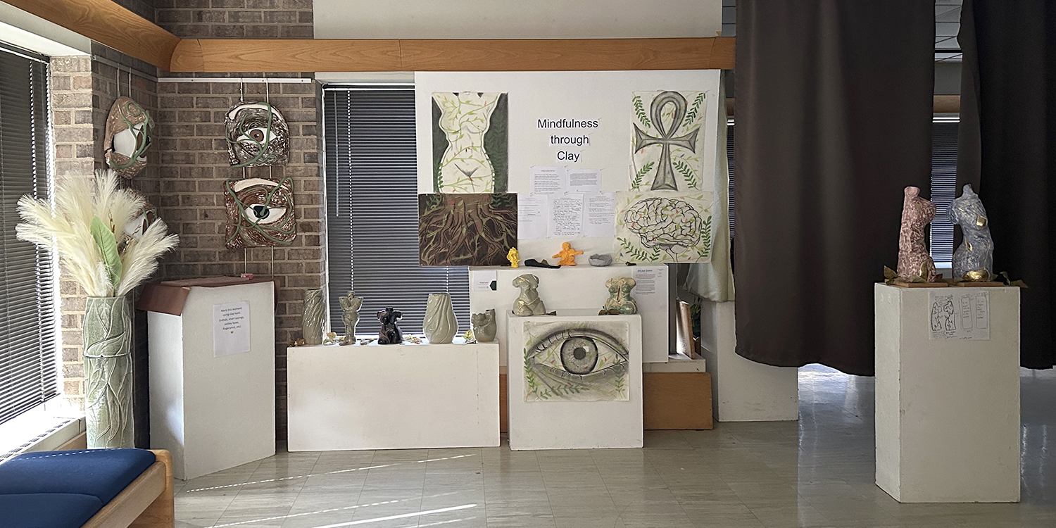 Student artwork displayed in gallery