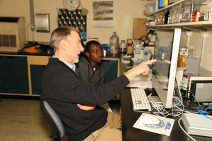 Dr. Swier and student evaluating experiment results