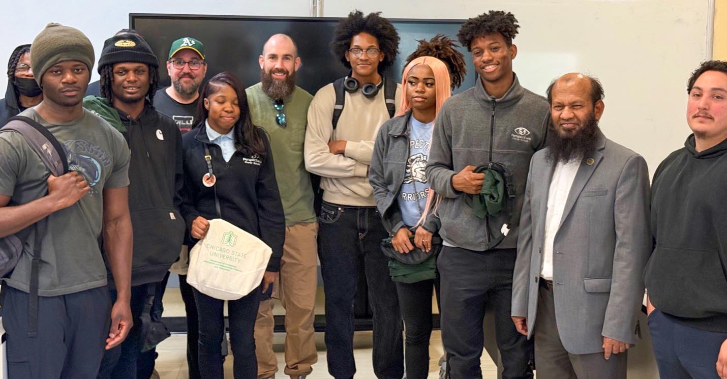 A group photo of CIMST faculty members, CSU students and high school students smiling.