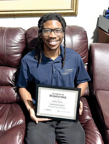 CSU student Jordan Harris pictured with his ComEd certificate.