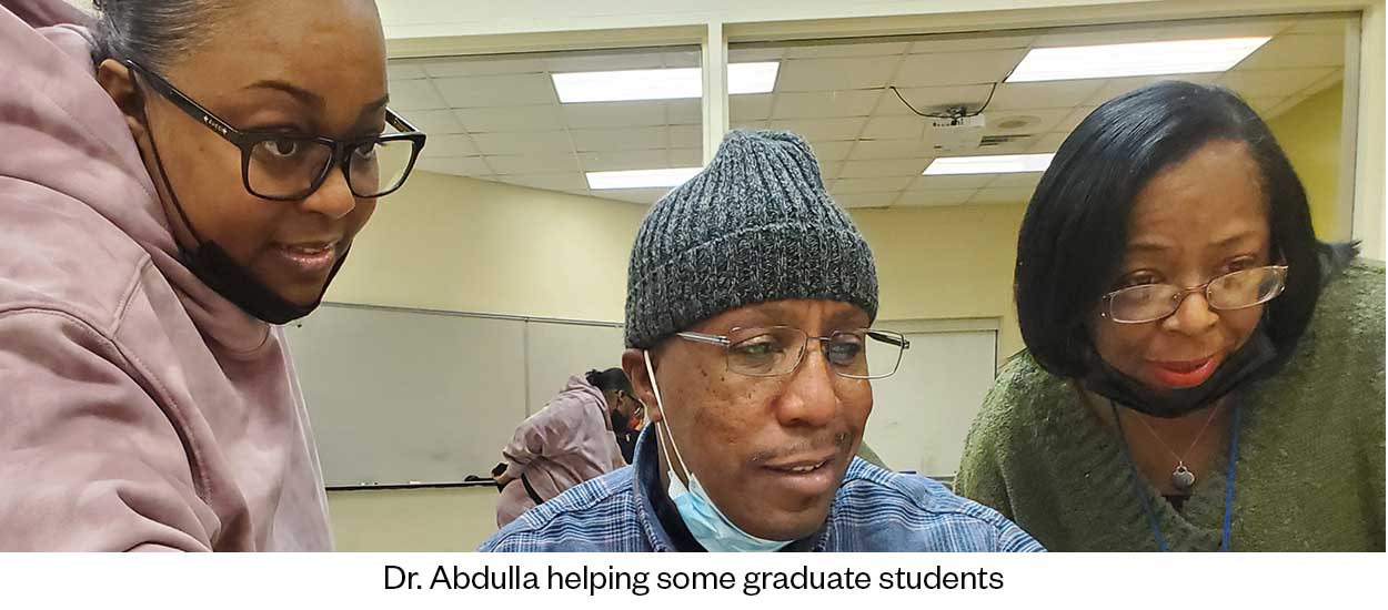 Dr. Abdulla helping some graduate students
