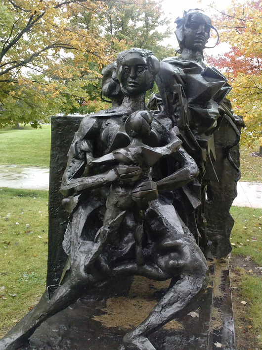 Sculpture of a family on campus